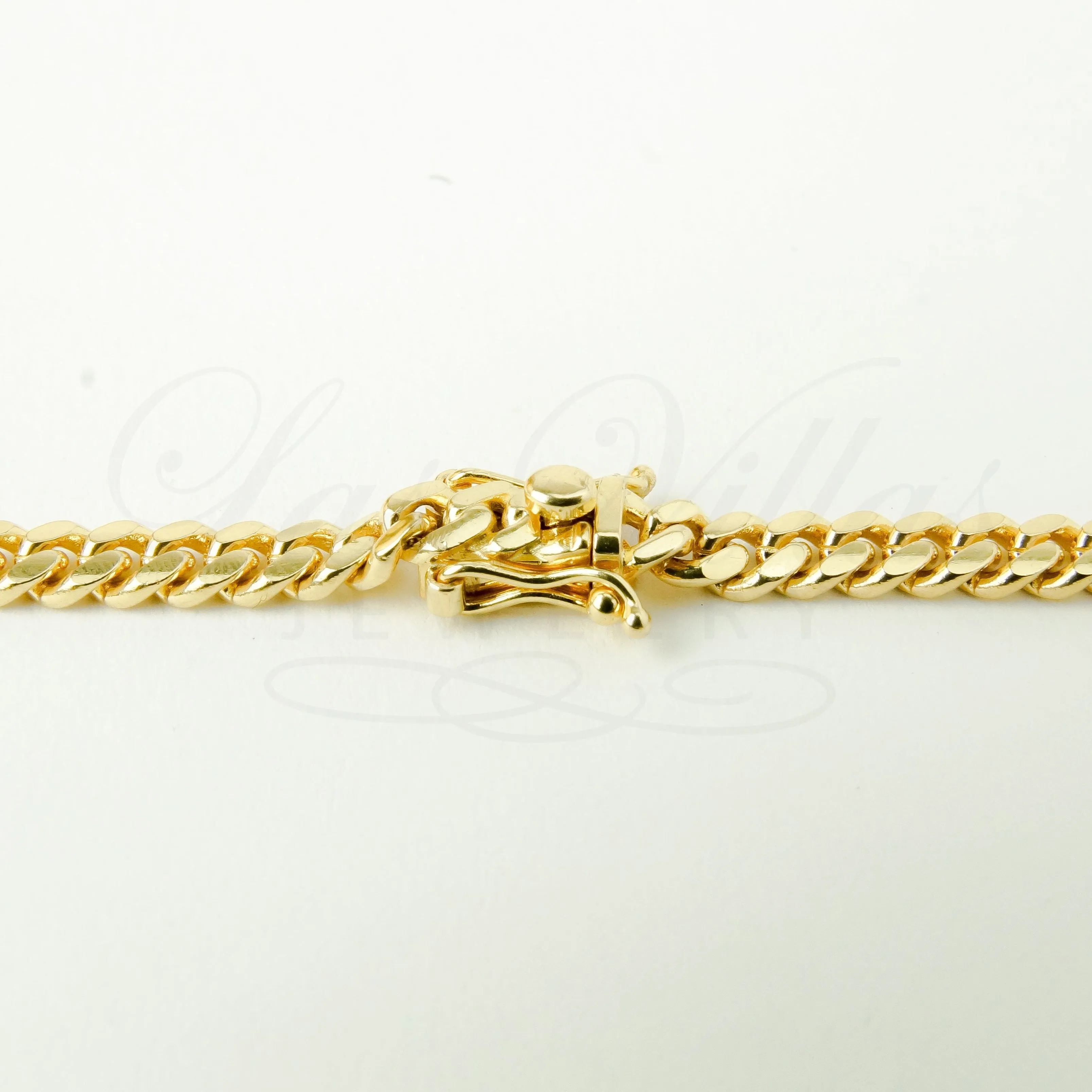 5.7mm machine-made solid Cuban Link Chain in 10K Gold