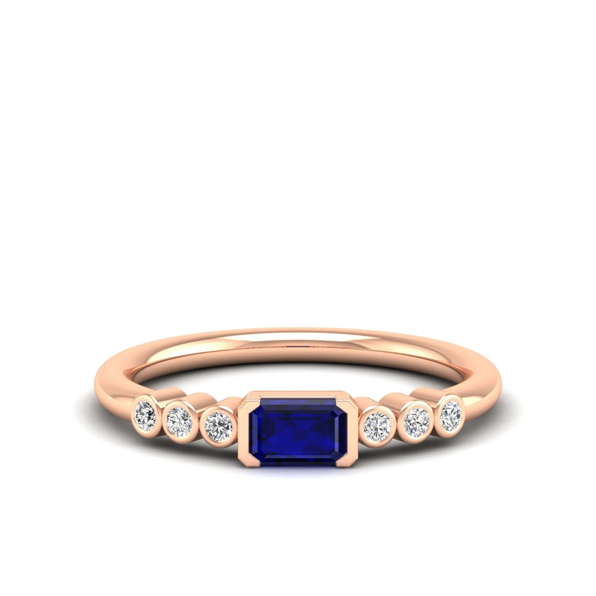 East-West Sapphire and Bezel Diamond Ring