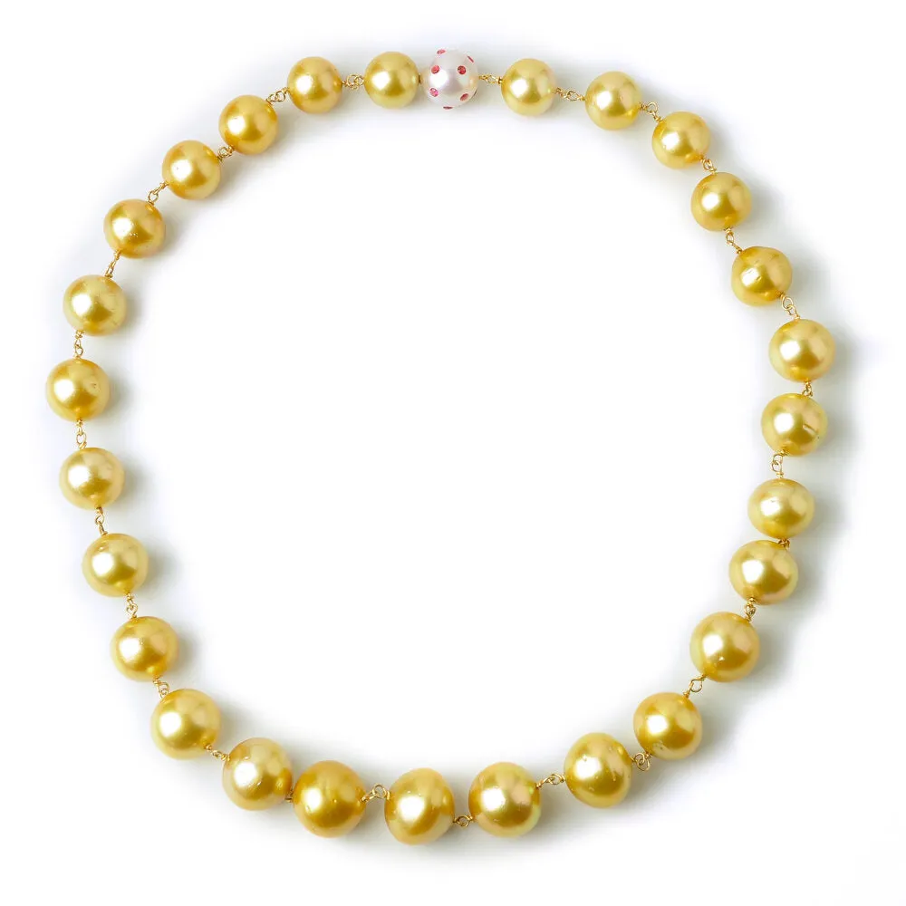 Golden South Sea Baroque Pearls with a South Sea Pearl and Padparadscha Sapphire Gemstone Clasp