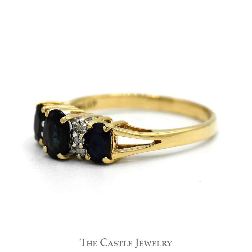 Three Stone Oval Sapphire Ring with Diamond Accents in 10k Yellow Gold Split Shank Setting